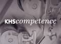 Black and white image of technical machine components with the overlaying text KHS competence.
